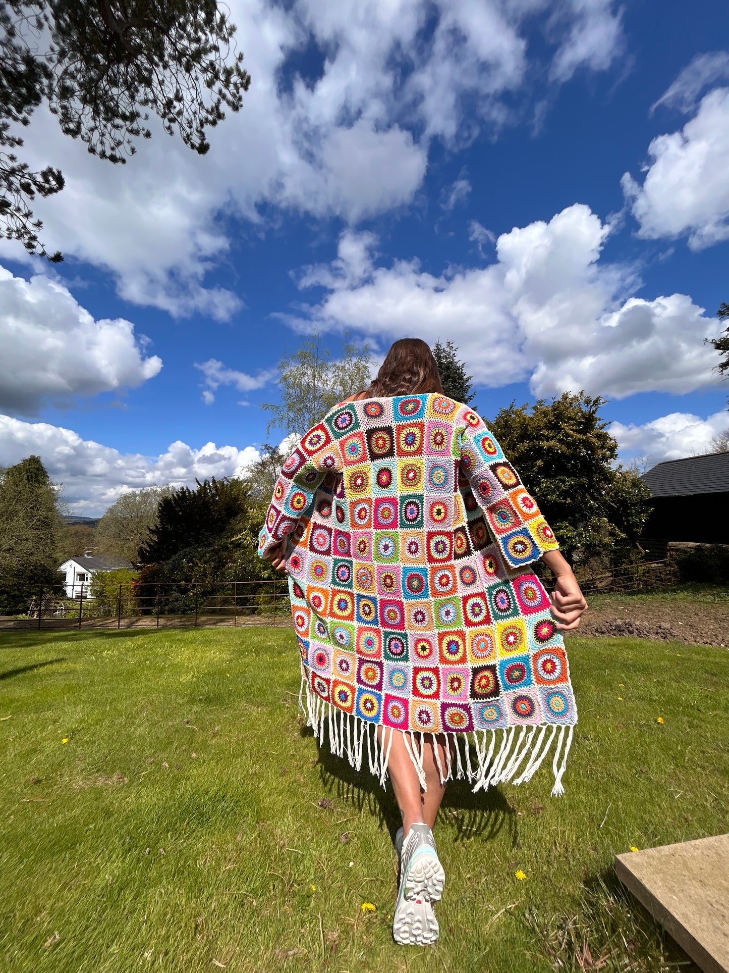 Granny square maxi crochet cardigan with tassels